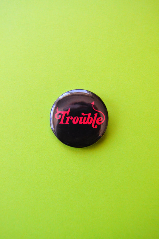 Trouble Pinback Button