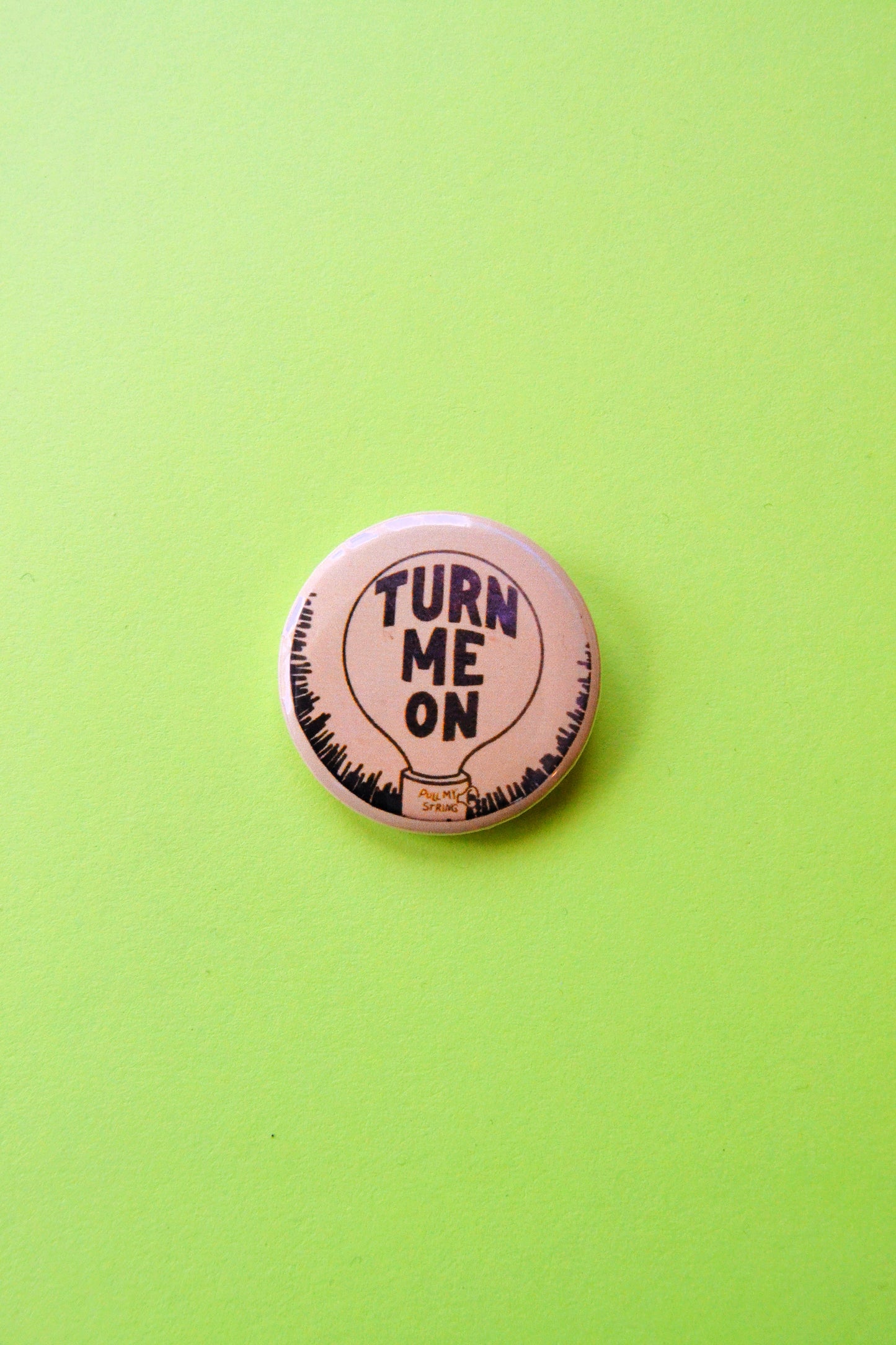 Turn Me On Lightbulb Reproduction Pinback Button
