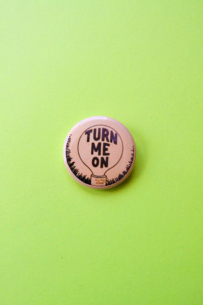 Turn Me On Lightbulb Reproduction Pinback Button