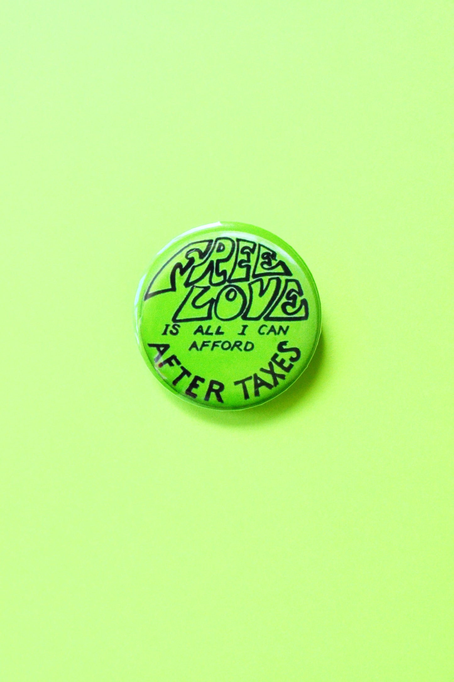 Free Love Is All I Can Afford After Taxes Reproduction Pinback Button