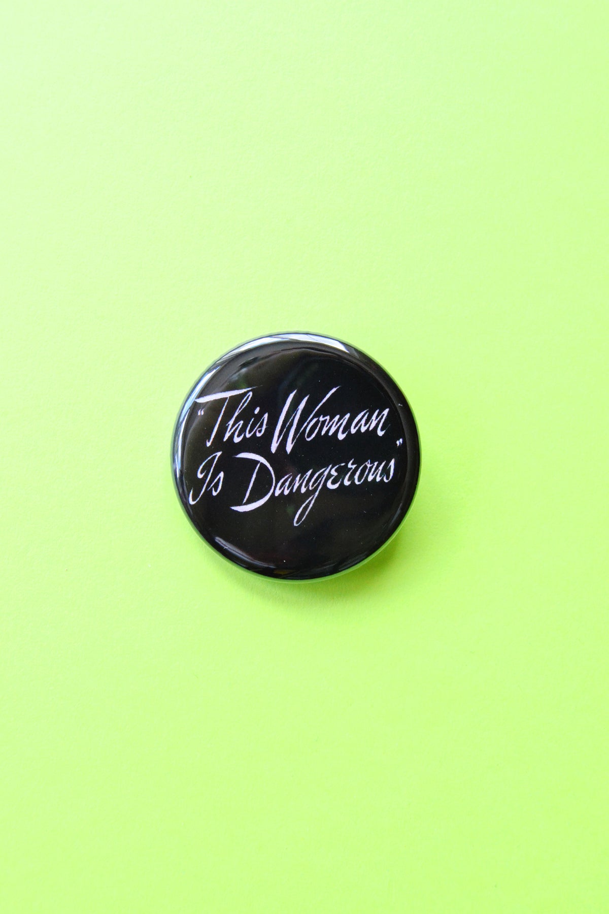 This Woman Is Dangerous Reproduction Pinback Button