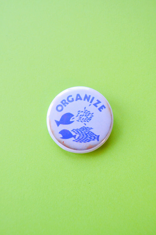 Organize Political Reproduction Button
