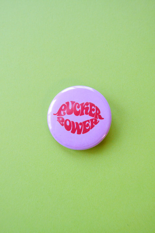 Pucker Power Reproduction Button