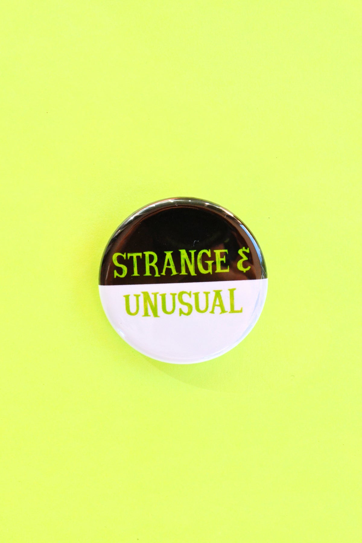 Strange and Unusual Pinback Button