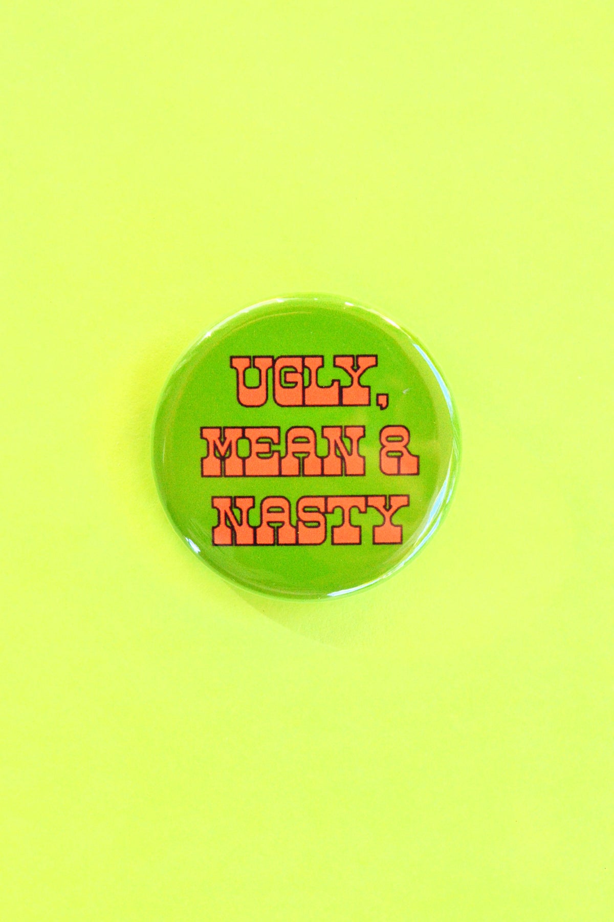 Ugly, Mean & Nasty Reproduction Pinback Button