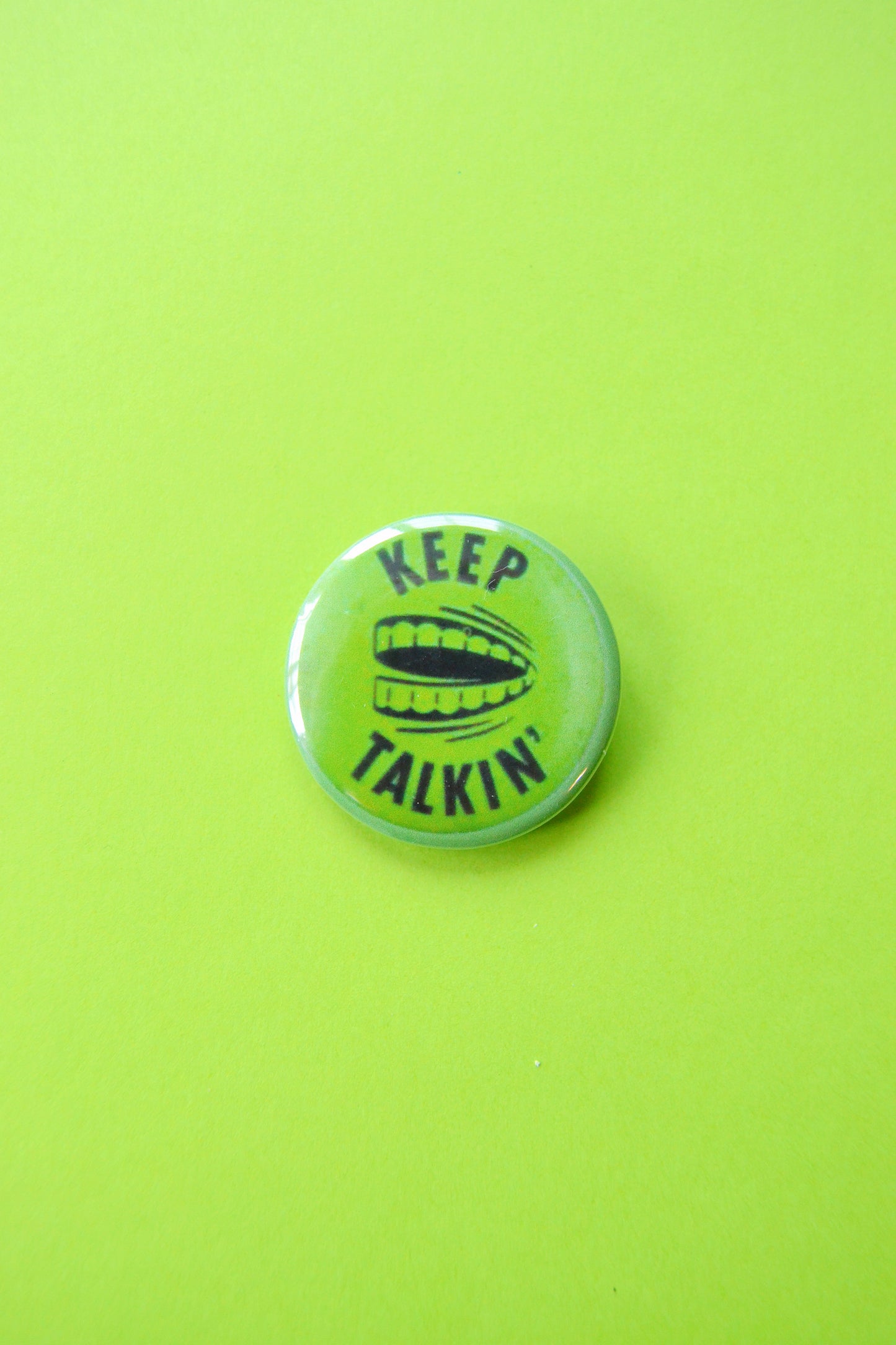 Keep Talkin' Reproduction Button