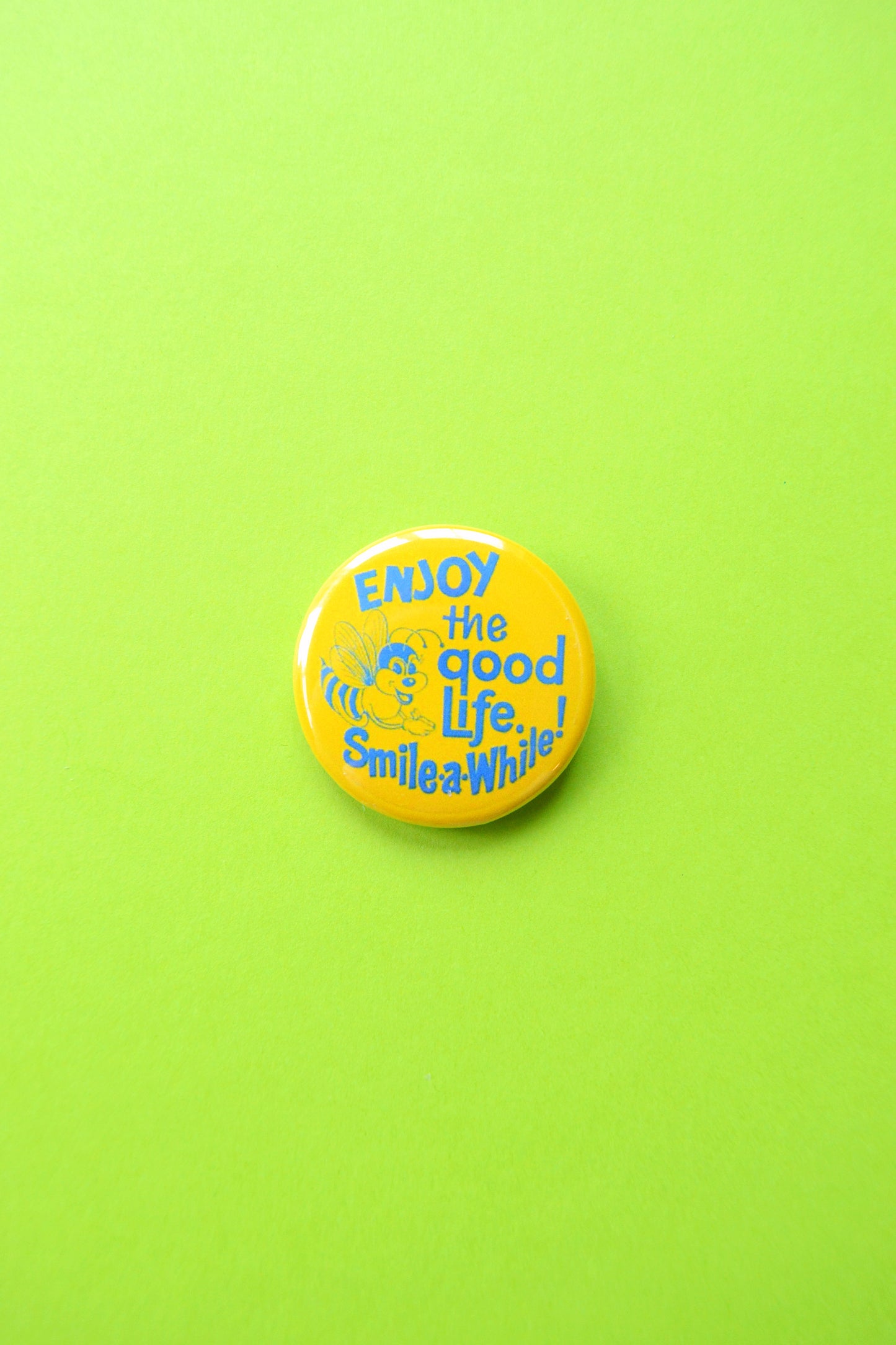 Smile Awhile Reproduction Button
