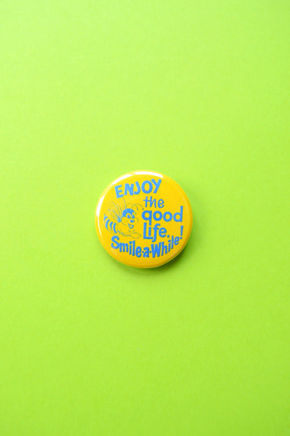 Smile Awhile Reproduction Button