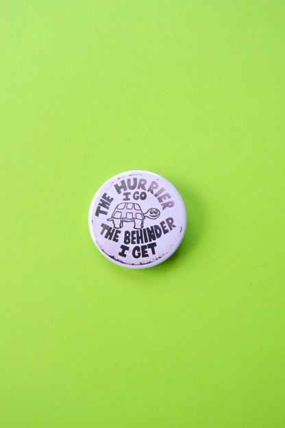 The Hurrier I Go, The Behinder I Get Reproduction Button