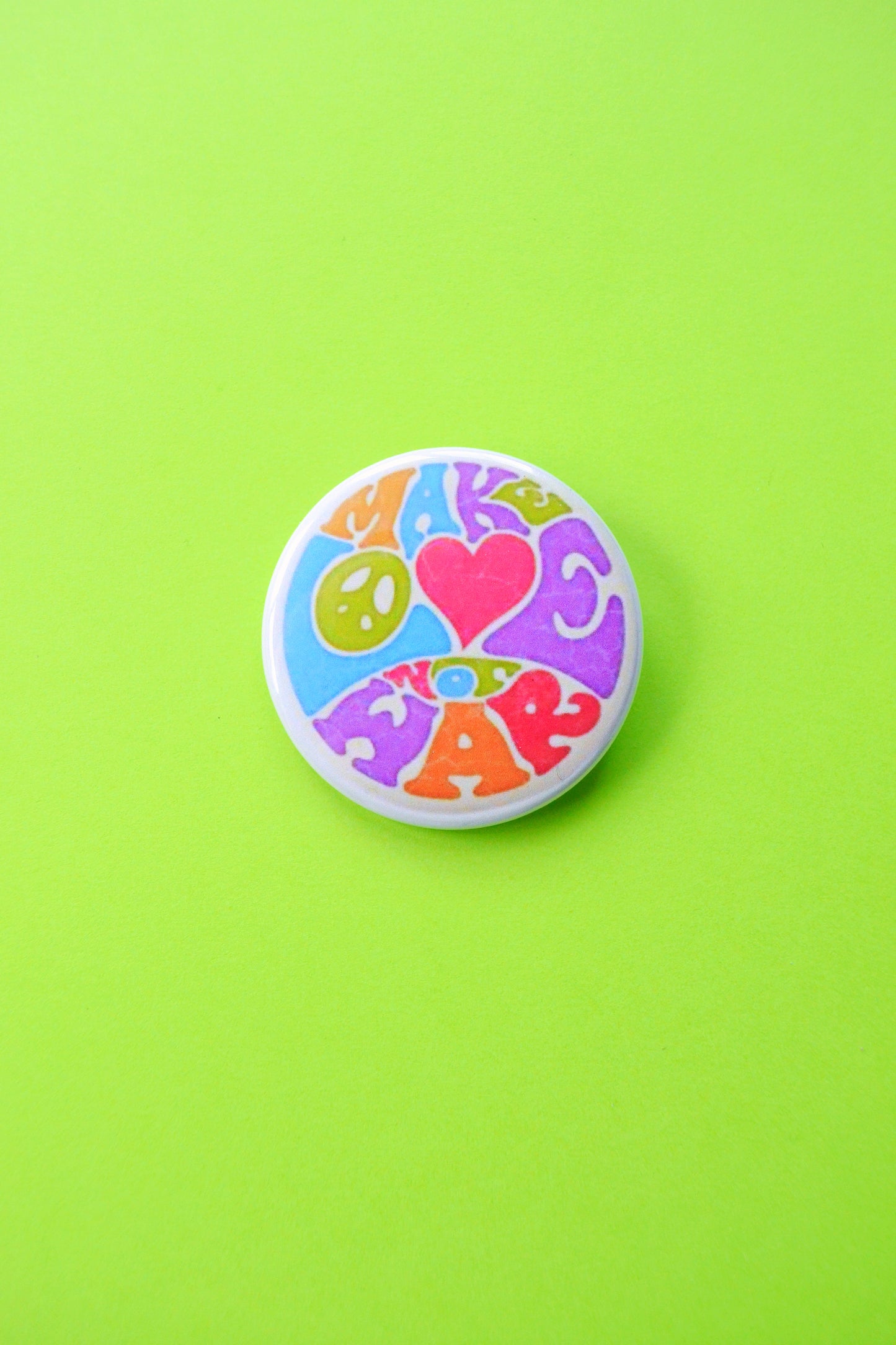 Make Love Not War Reproduction Button