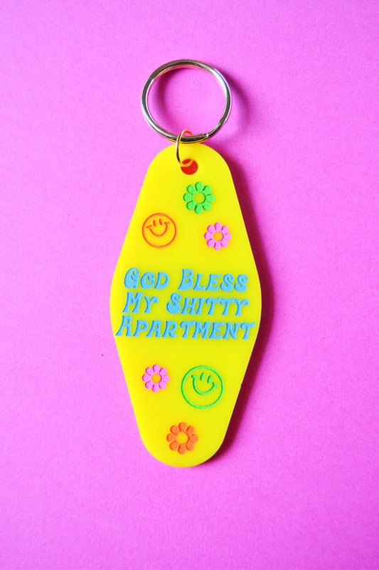 God Bless My Shitty Apartment Keychain