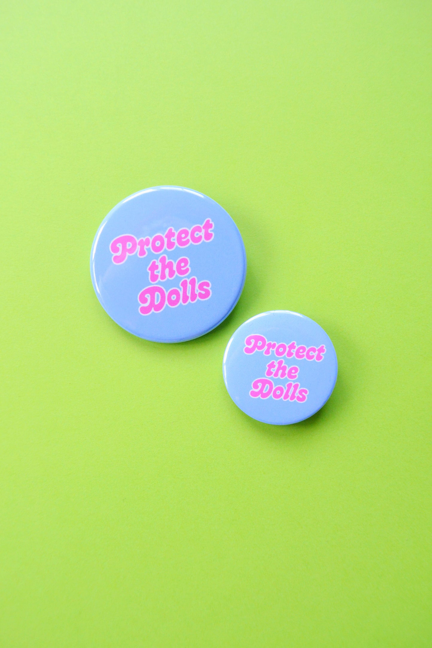 Protect the Dolls Button