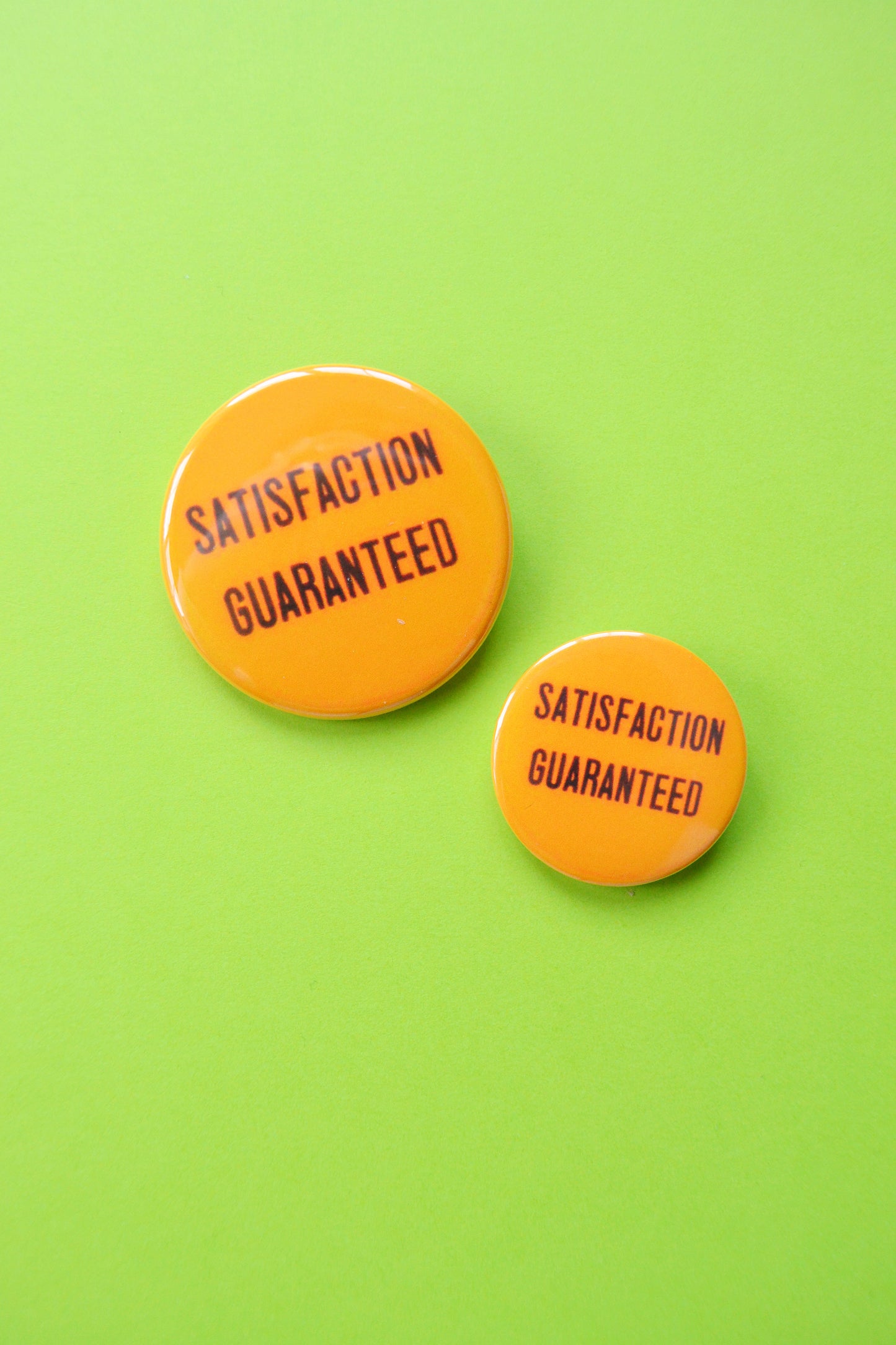 Satisfaction Guaranteed Reproduction Button
